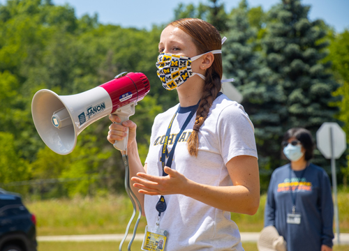 Jenna Koelsch speaking to participants of the walk.