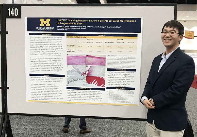 Second-year Resident Dr. Maxwell Wang presenting one of many posters offered by our faculty and trainees.