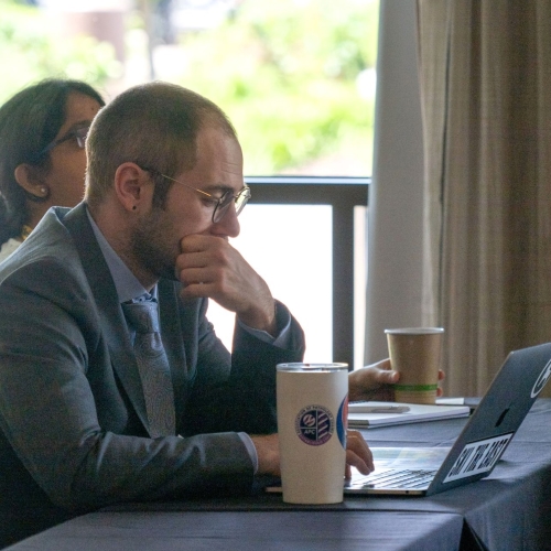 Dr. Ryan Landvater prepares for his presentation.