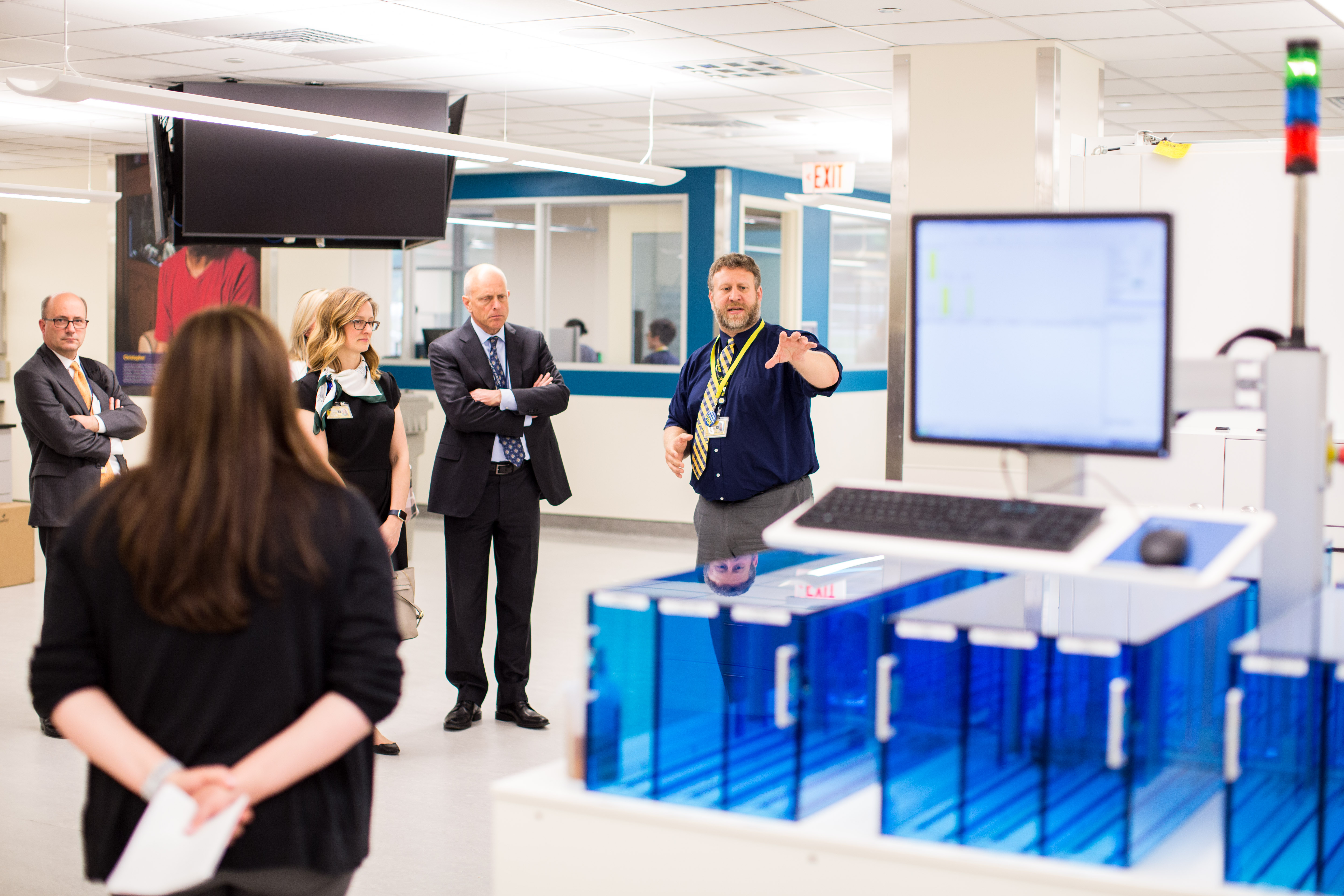 Dr. Lephart showing the new automation system installed in one of the labs.